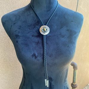 Bolo tie with amber stone